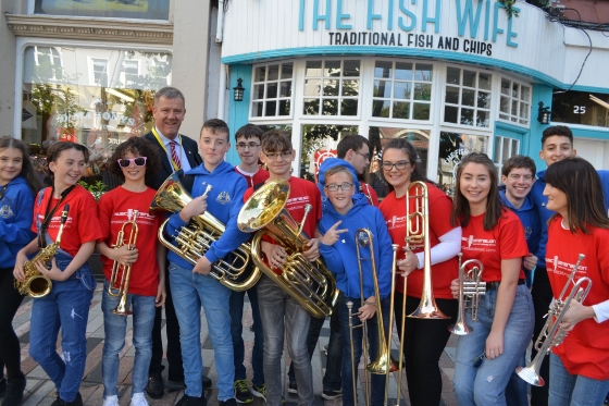 Musicians from Cork City’s Barrack Street Youth Band were among the first to greet HRH Prince Charles, Prince of Wales and Camilla, Duchess of Cornwall as they began a two-day tour of the Republic of Ireland on Thursday at the English Market.
