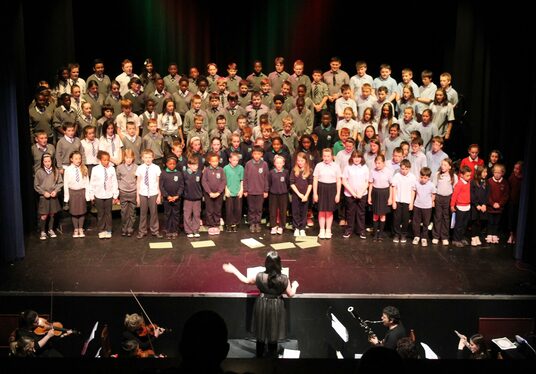 Choral conductor and master teacher Dr. Doreen Rao delivers workshops to young singers