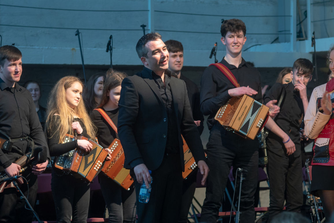 Musician Martin Tourish and members of the Music Generation Laois Trad Orchestra. Image: Music Generation Laois