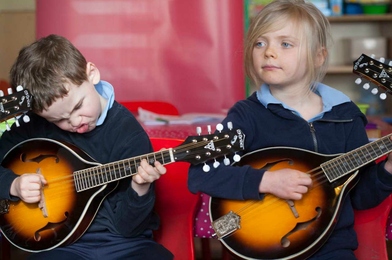 Budding mandolin players from Music Generation Roscommon, Ciara and Joseph, made the front page of The Irish Times early in the new year in this shot captured by photographer Brian Farrell Budding mandolin players from Music Generation Roscommon, Ciara and Joseph, made the front page of The Irish Times early in the new year in this shot captured by photographer Brian Farrell
